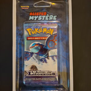 Pokemon blister pack labeled 'Blister Mystere' containing Pokémon trading cards in a clear plastic case on a dark background.
