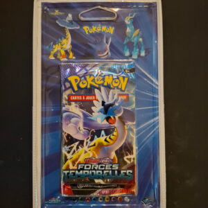 Blue Pokémon trading card booster pack in plastic, featuring three illustrated Pokémon on the packaging.