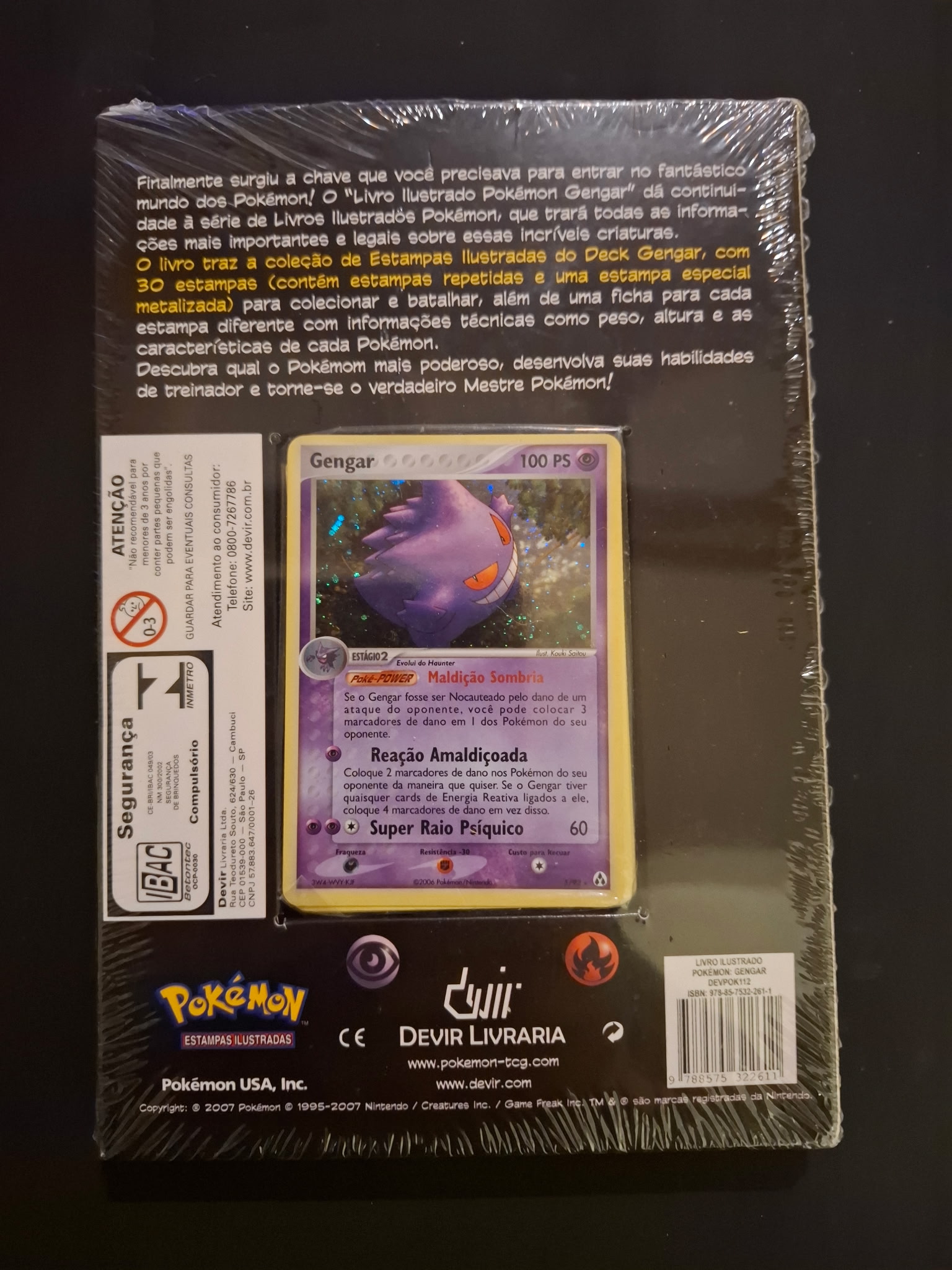 20260828013418 JM Cards Caixa selada de Pokémon com a carta Gengar visível e texto em português na contracapa descrevendo o conteúdo do kit