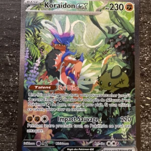 Pokemon card: Koraidon ex with 230 HP in a jungle scene, text reads 'Talent Cri Dino' and 'Impact Sauvage 220' (French].)