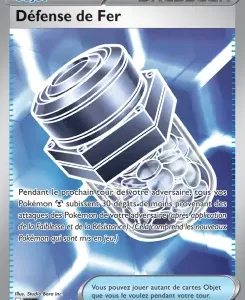 Trainer card 'Défense de Fer' showing a large silver mechanical device against a blue energy background with French card text below.