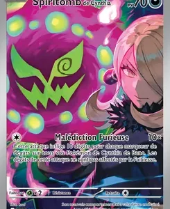 Pokémon card featuring Spiritomb de Cynthia with 70 HP, artwork showing Spiritomb in a purple-green glow and Cynthia on the right; attack named Malédiction Furieuse with its description visible on the card.
