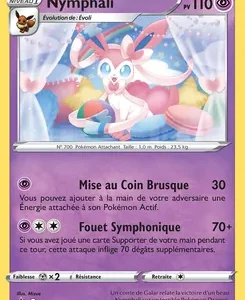 Carte Pokémon Nymphali (Sylveon) française — HP 110; attaques Mise au Coin Brusque 30 et Fouet Symphonique 70+; Sylveon sur un lit pastel.