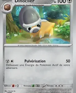 Dinoclier Pokémon card, 100 HP, illustration of a small yellow dinosaur-like Pokémon in a forest; attack Pulverisation deals 50 damage and discards one of your opponent's Energy.